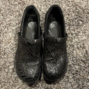Black Embossed BOC Slip-On Shoes